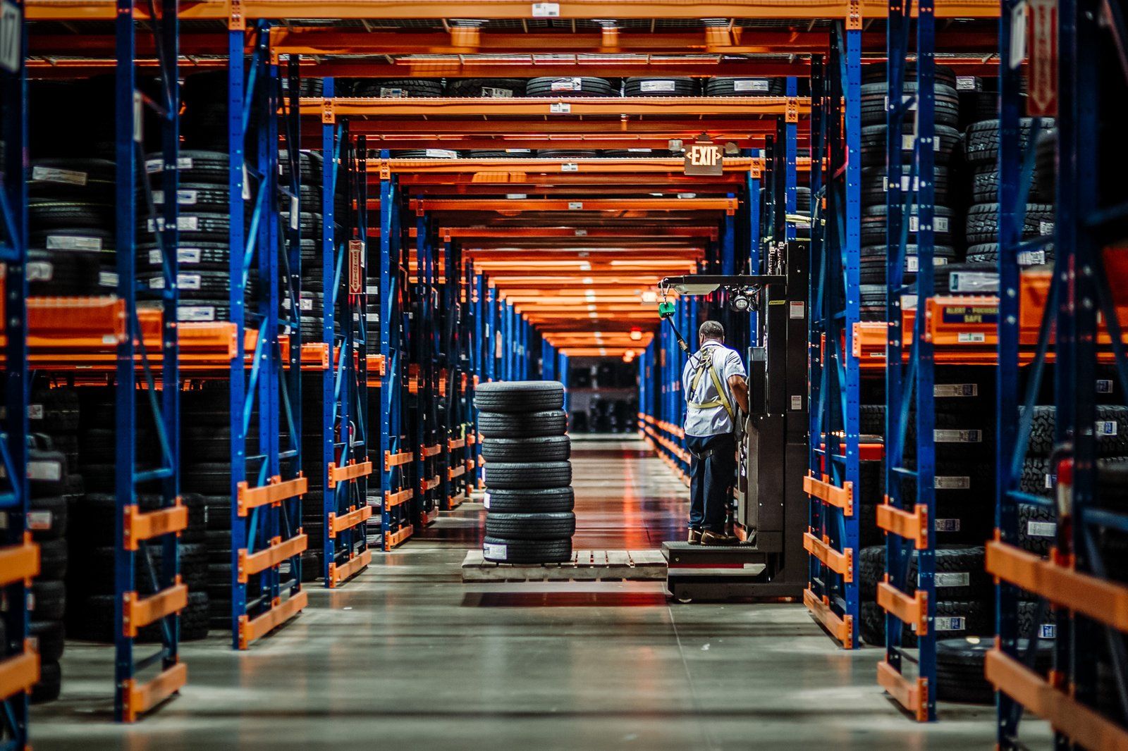 Long aisle of tire racking in a distribution center