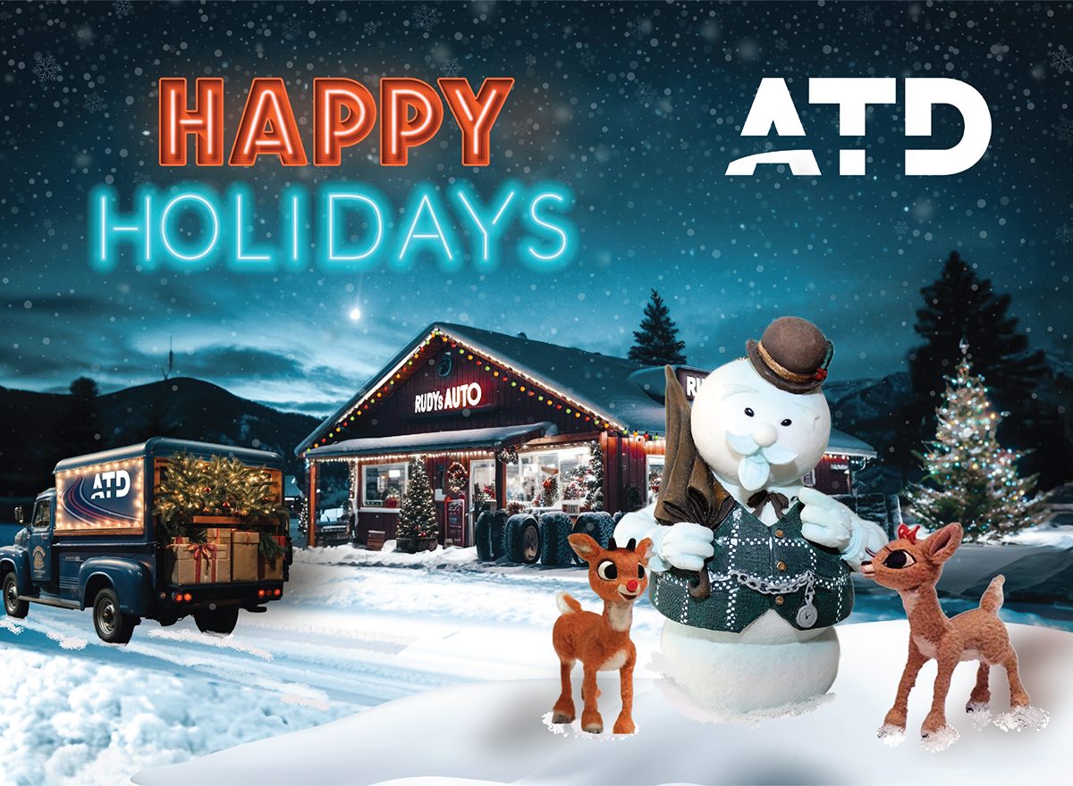 Happy Holidays card with a snowy tire shop scene