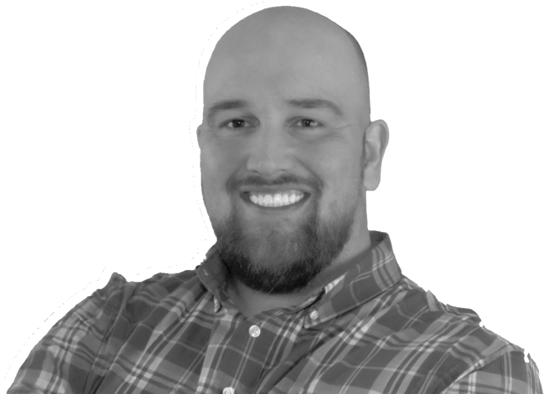 Jeff Hill, smiling, in a plaid shirt